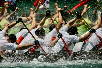 paddlers in a dragon boat race