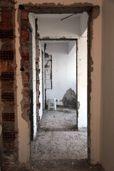 Home renovation. The walls and floors will be completely renovated. Vertical.