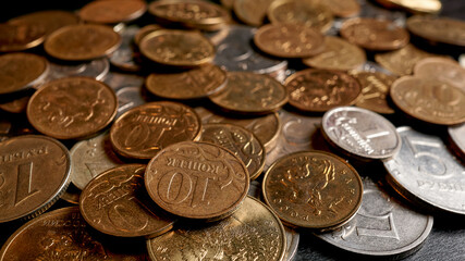 A scattering of Russian coins of rubles and kopecks