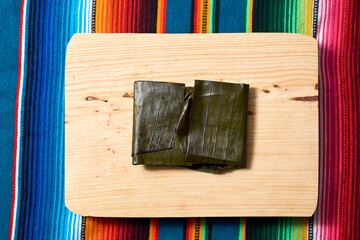 Oaxacan tamal made of corn chicken. Mexican food..