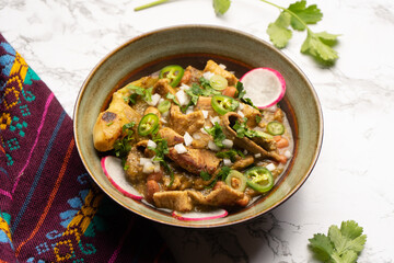 Meat in its juice is a stew with green sauce and steak. Mexican food