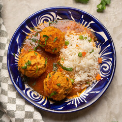 Meatballs with chipotle red sauce and rice. Mexican food