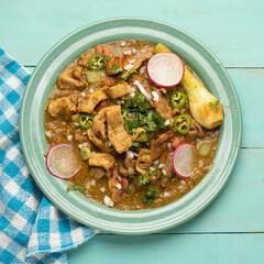 Meat in its juice is a stew with green sauce and steak. Mexican food