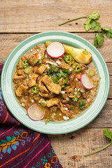 Meat in its juice is a stew with green sauce and steak. Mexican food