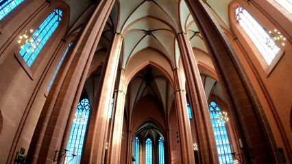Frankfurt am Main, Germany, December 7, 2021: TILT SHOT - A view from below of four columns supporting the high, arched ceiling of Frankfurt's Saint Bartholomeus's Cathedral.  - Powered by Adobe