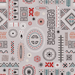 African art decoration pattern tribal geometric shapes seamless background. Colored flat vector boho symbols illustrations. Ancient indian shapes and animal print doodles.
