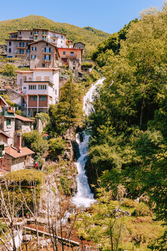 Waterfall on the mountain of village of Nesso. Orrido of Nesso, vertical