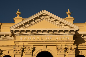Inticate detail of the pediment on the old historic and heritage listed School of Arts building in Rockhampton, Queensland. - obrazy, fototapety, plakaty