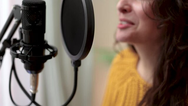 Host woman recording podcast online and live streaming on social media