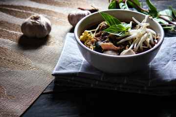 Thai noodle with pork is a street food that is commonly sold in Thailand. Also known as 