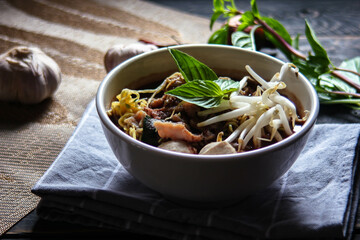 Thai noodle with pork is a street food that is commonly sold in Thailand. Also known as 
