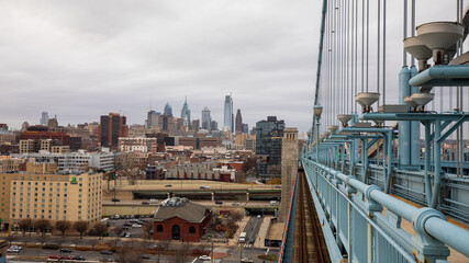 Fototapeta premium Philadelphia, Pennsylvania, USA - December 15 2021: Philadelphia downtown skyline. View from Benjamin Franklin Bridge. 