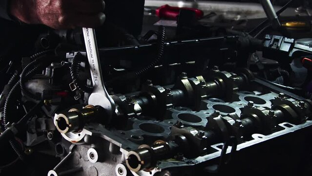 Cylinder Head of Old Disassembled Car Engine in Repair Shop Footage.