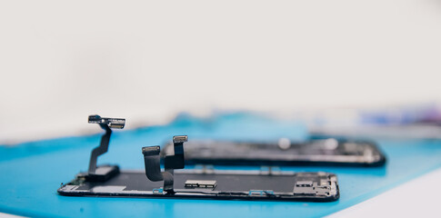 Loops from screen of mobile phone, banner master dismantled for repair