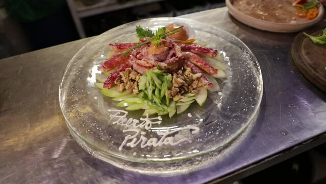 Seafood. Closeup view of a King Crab dish in the restaurant kitchen, ready for service.  