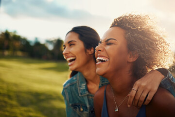 Friends who crack you up are the best. Cropped shot of two attractive young girlfriends having a...