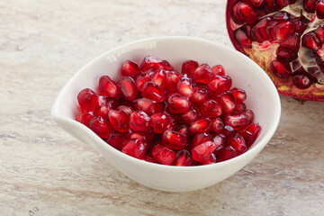 Ripe red Pomegranate seeds in the bowl
