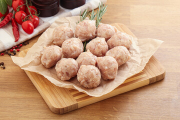 Raw chicken meatballs for cooking