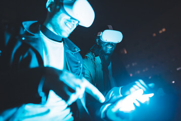 Two friend experimenting metaverse and new augmented realities - Friends having fun while...