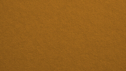 The surface of bright brown cardboard. Paperboard wallpaper. Textured pasteboard background. Paper...