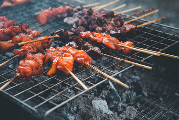 Grilled chicken sauce at Thai street food market