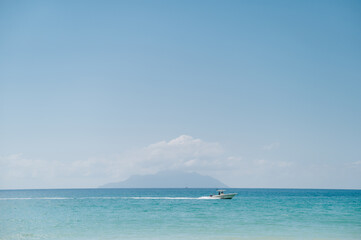 Lonely boat on the sea in the distance