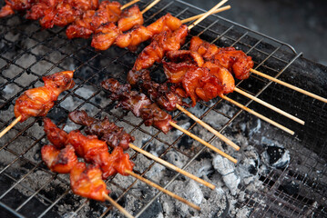 Grilled chicken sauce at Thai street food market