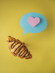 Croissant and bubble with heart. Chocolate, sweet, dessert, love. Breakfast and brunch. 