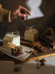 Secret cookies and milk. Alice in Wonderland. Eat me. Hand with a key. 