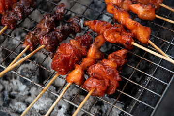 Grilled chicken sauce at Thai street food market