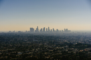 Obraz premium Los Angeles city skyline silhouette in fog. Construction business concept.