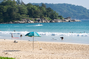 Umbrella on beach sunny tourism in holiday of tropical island on summer.