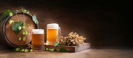 mug of beer, wheat ears, green hops and beer barrel