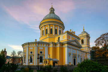 Fototapeta na wymiar View of the Trinity Cathedral in the current male Orthodox monastery of the Holy Trinity Alexander Nevsky Lavra on an autumn morning, St. Petersburg, Russia