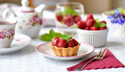 Mini tarts with raspberries fruits
