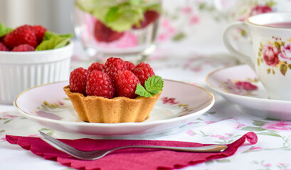 Mini tarts with raspberries fruits