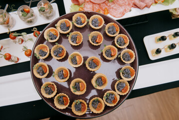 Delicacies and snacks at the buffet or banquet. Catering.