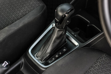 automatic transmission shift selector in the car interior. Closeup a manual shift of modern car...