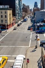 City Street crossroads with traffic, aerial view from The High Line, Chelsea, New York City during...