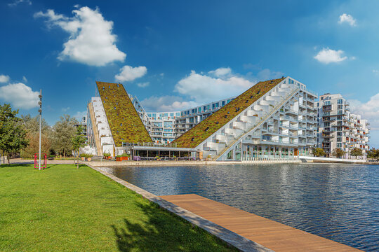 8 Tallet , also known as Big House, is a large mixed-use development built in the shape of a figure 8. Copenhagen, Denmark