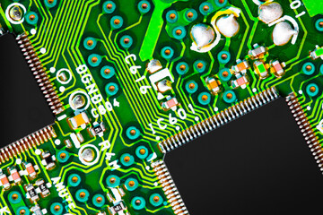 Close up of components and microchips on PC circuit board.