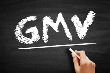 GMV Gross Merchandise Volume - total amount of sales a company makes over a specified period of time, acronym text on blackboard - obrazy, fototapety, plakaty