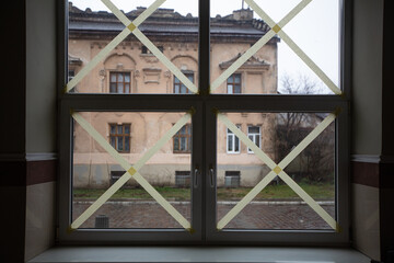 Taped windows in Lviv during russian war