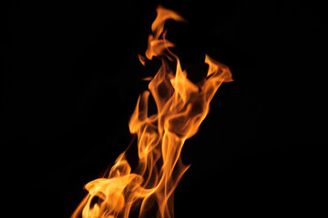 Close up burning flames on black background for graphic design or wallpaper