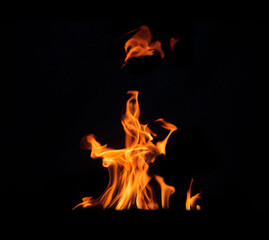 Fototapeta premium Close up burning flames on black background for graphic design or wallpaper