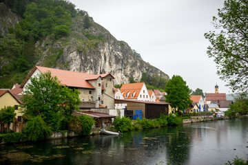 Fototapeta premium Idyllic view of the village of Markt Essing in Bavaria, Germany in the Altmühltal on a sunny day in spring