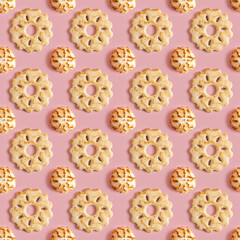 Seamless pattern with Passover wine cookie and coconut macaroons for Jewish holiday Pesach (Passover) on pink background.