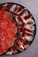 Portion of Iberian ham and 100% acorn-fed loin from Extremadura and 100% acorn-fed Iberian lomo
