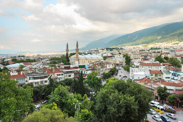 Fototapeta premium Bursa landscape from Bursa castle. Grand mosque (Ulucami) and city view. 