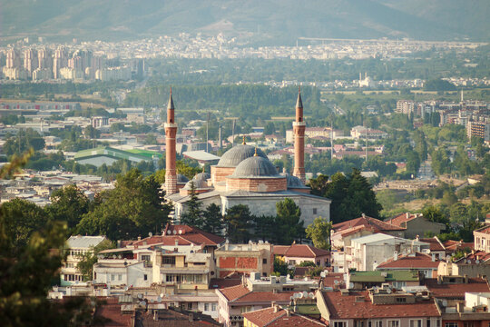 Sultan Yildirim Beyazit complex in Bursa. Historical Ottoman mosque with city view. Bursa landscape from Emir Sultan mosque.